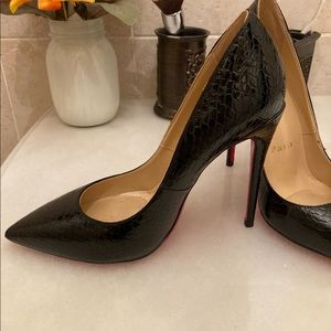 Christian Louboutin’s size 38 with dust bag